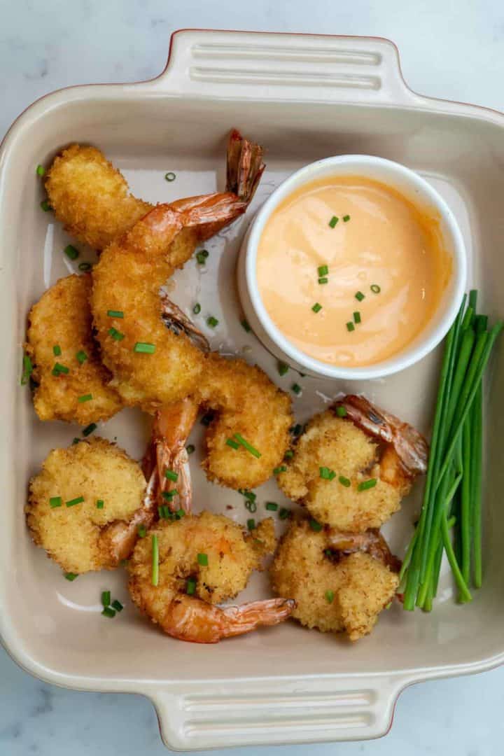 This Rock Shrimp Tempura is made with fresh shrimp, cornstarch, vegetable oil, egg, flour, cold water, and served with a spicy mayo.