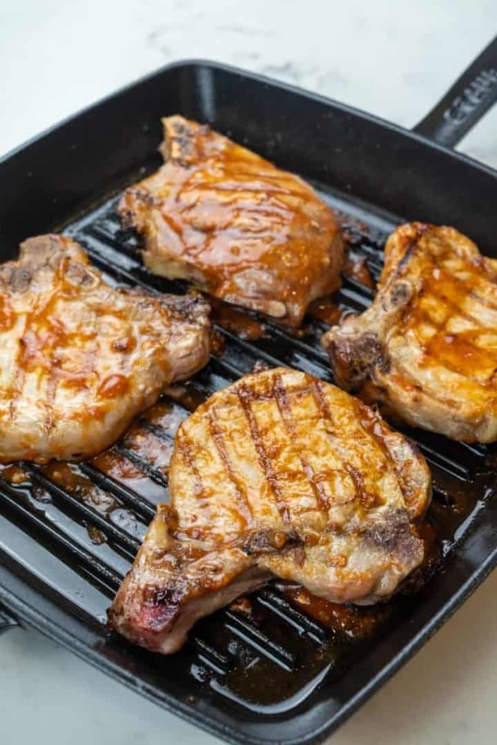 This Sweet and Sour Pork Chops Recipe is made with bone-in pork chops, ketchup, marmalade, garlic, lemon juice, and horseradish.