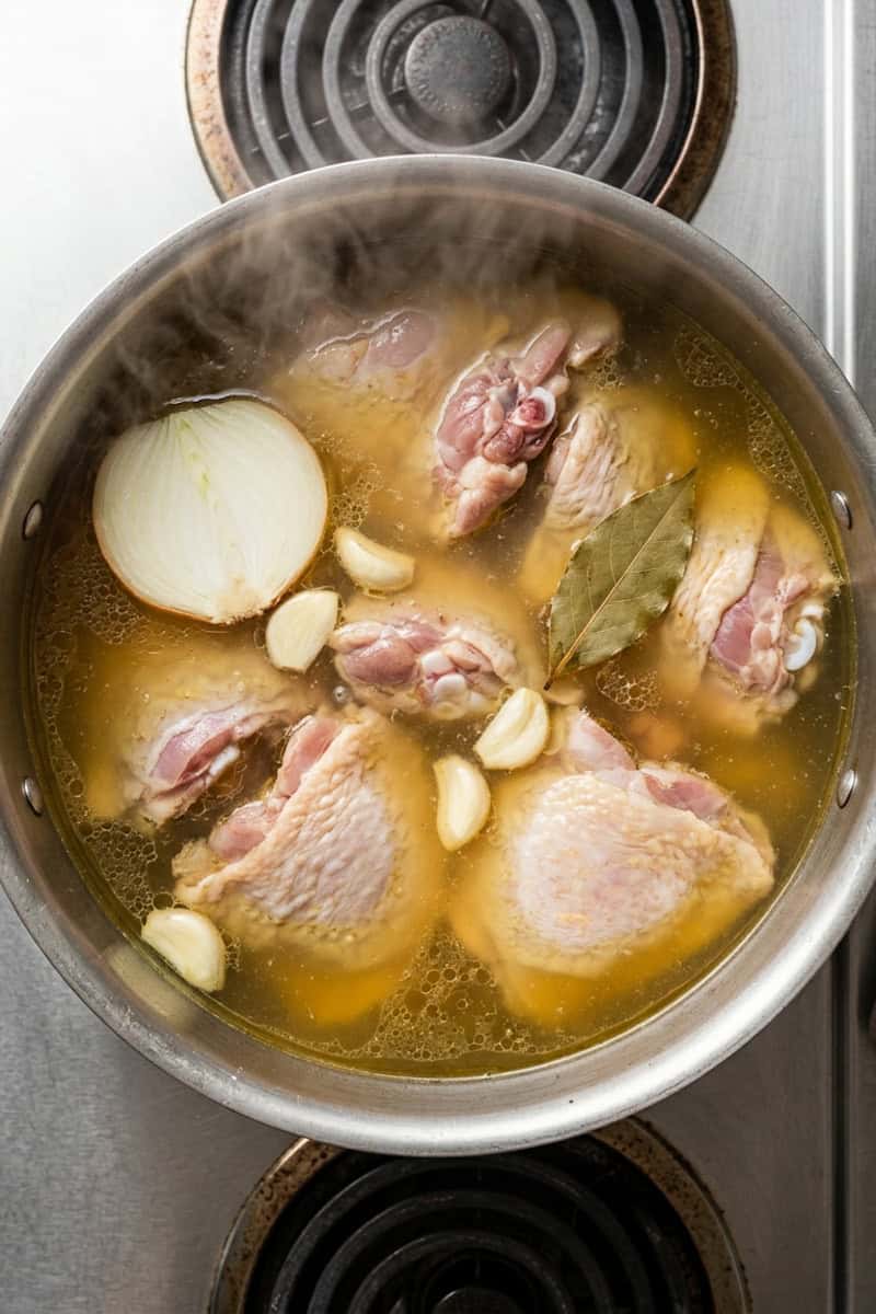 Chicken boiled in broth to use for filling