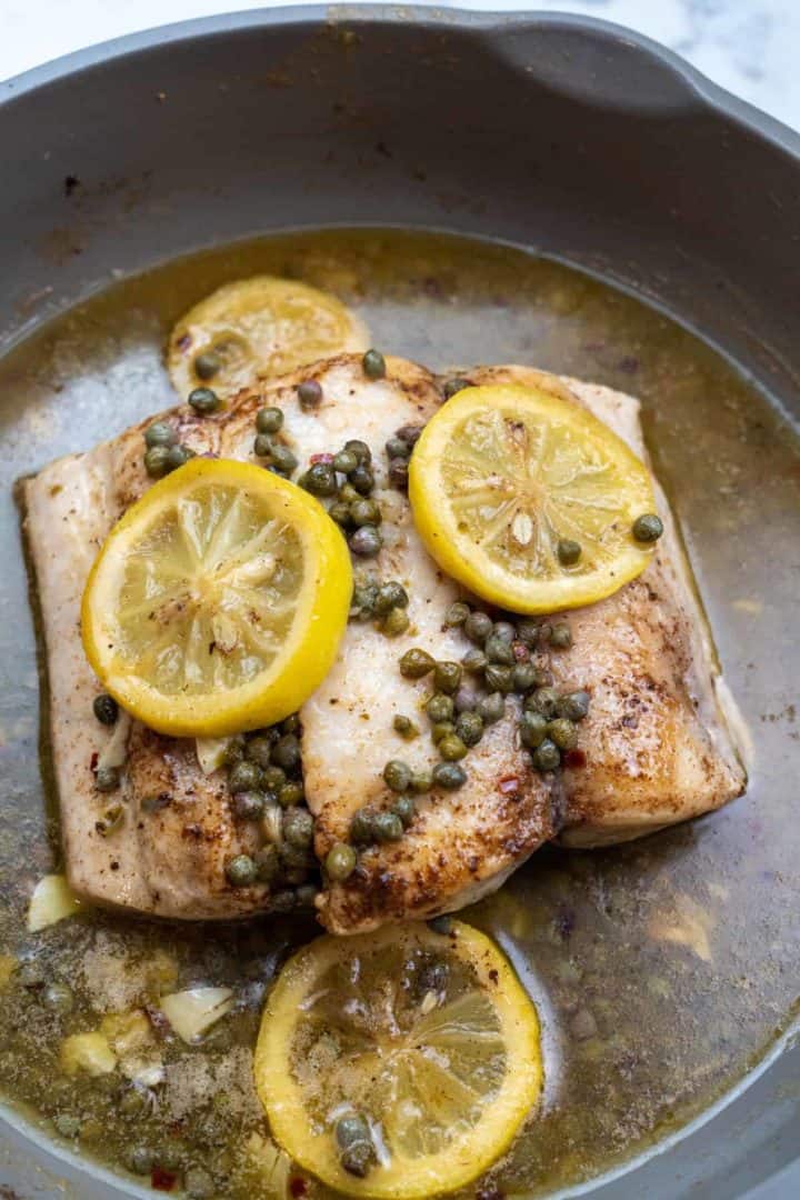 This Italian Mahi Mahi Recipe with Lemon Butter Sauce is made with mahi mahi, butter, garlic, white wine, lemon, capers, and parsley.