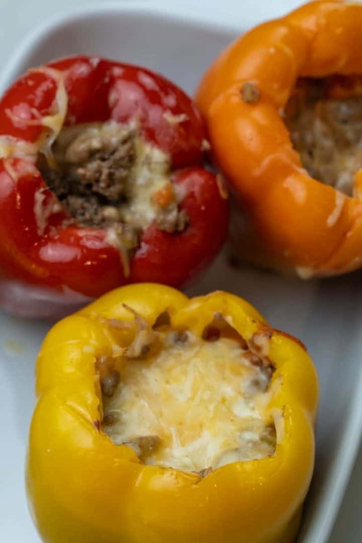 These Classic Easy Stuffed Peppers (Keto) are made with ground beef, onion, garlic, carrots, celery and tomatoes which are cooked and stuffed in bell peppers.
