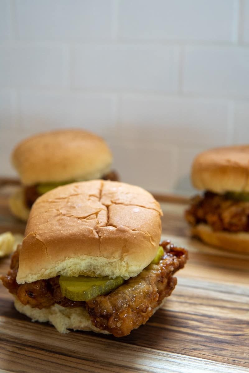 This Hot Honey Fried Chicken Sandwich Recipe is made with buttermilk, flour, spices and is deep fried to perfection.