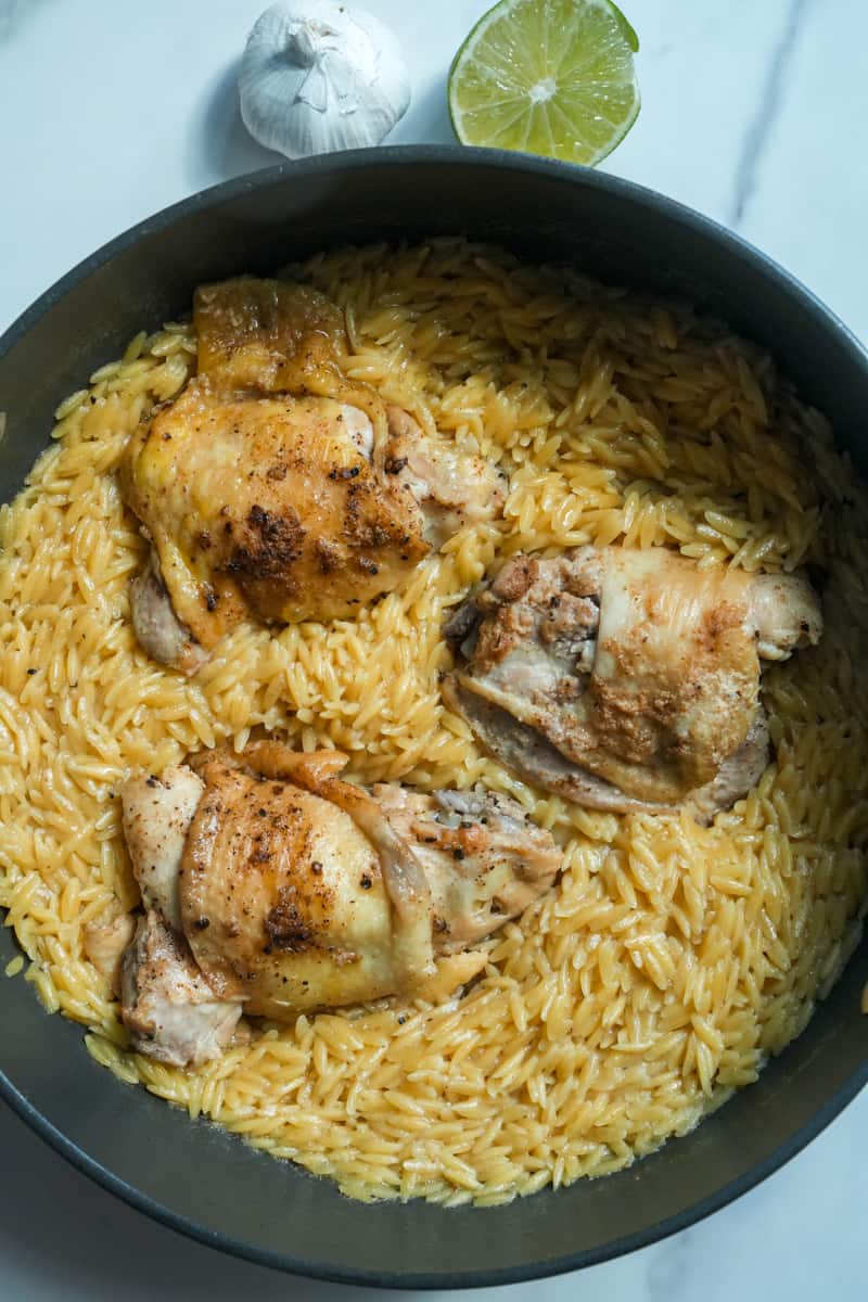 This One Pot Chicken Orzo Recipe is made with chicken, garlic, bay leaves, chicken broth and simmered to perfection.