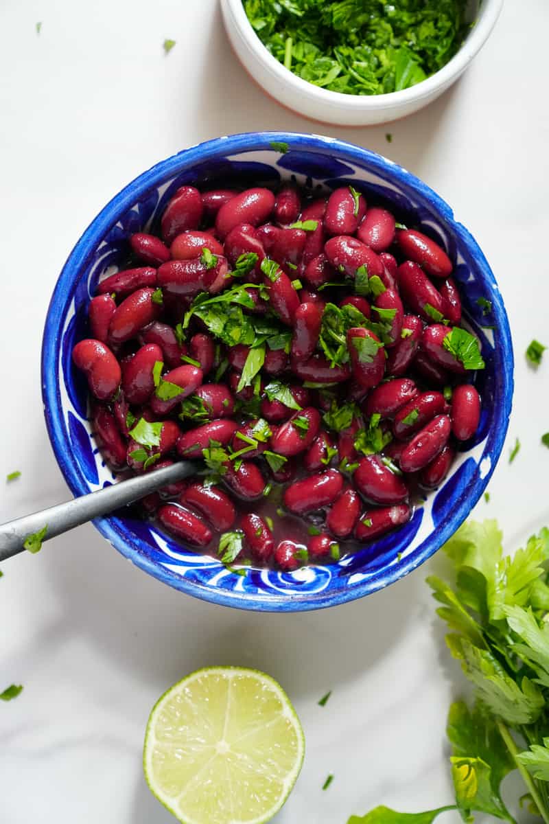 This Instant Pot Kidney Beans Recipe is made with lime, cilantro, black beans, and broth in an Instant Pot.