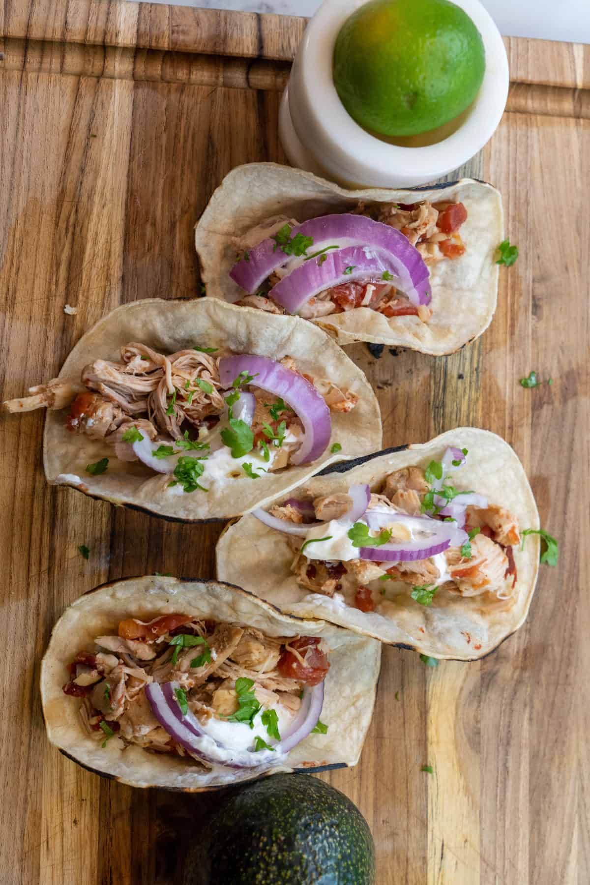 Mexican chicken tinga in smoky chipotle tomato sauce