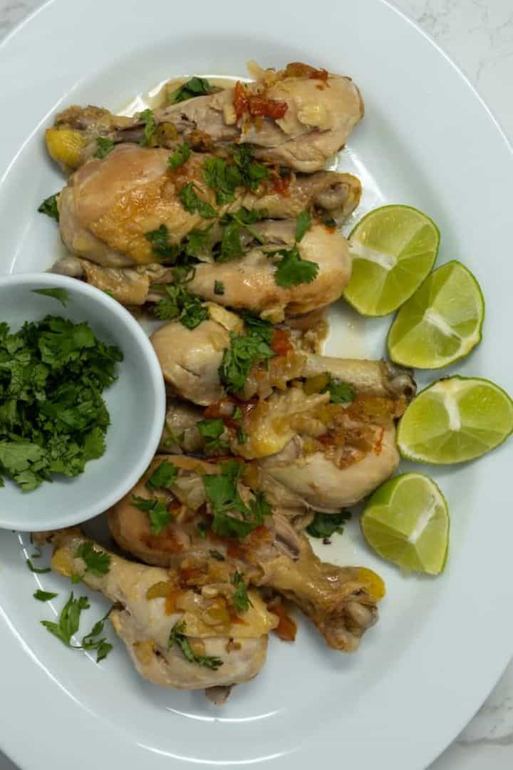 This Latin Braised Chicken Recipe are made with drumsticks, red onions, garlic, celery, broth, tomatoes, limes, and cilantro.