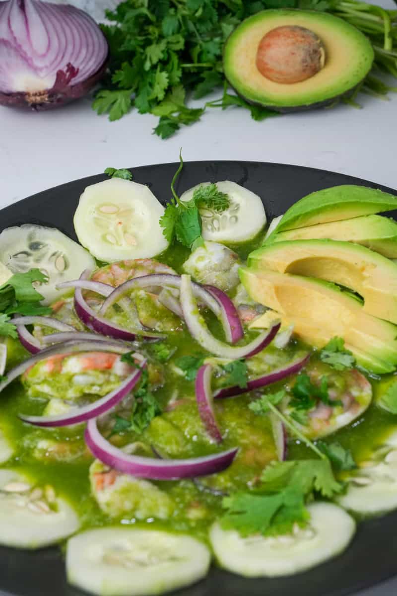 This Shrimp Aguachile Recipe (Aguachile de Camarón) is made with jalapeños, limes, cilantro, shrimp, cucumber and onion.