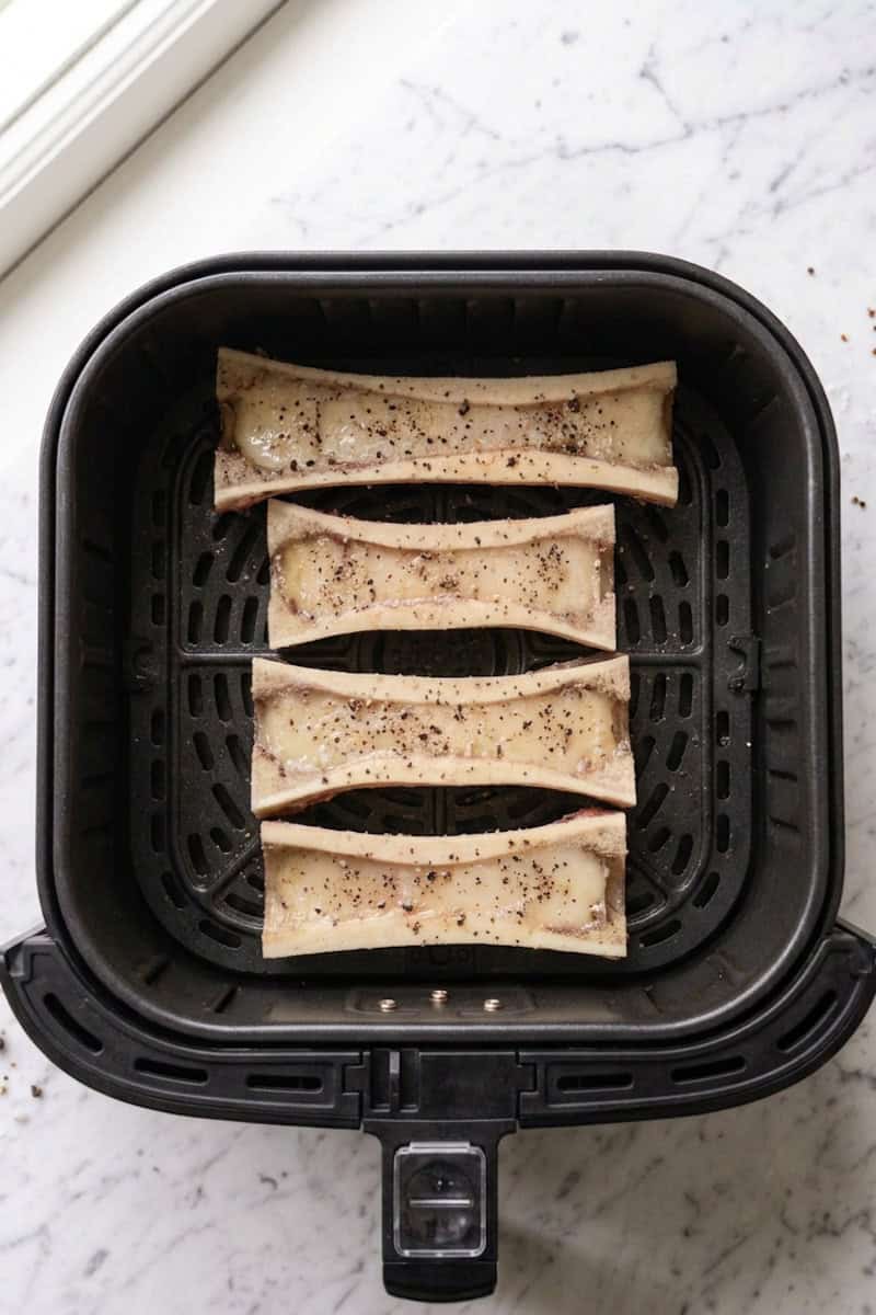 Marrow bones arranged in the air-fryer basket
