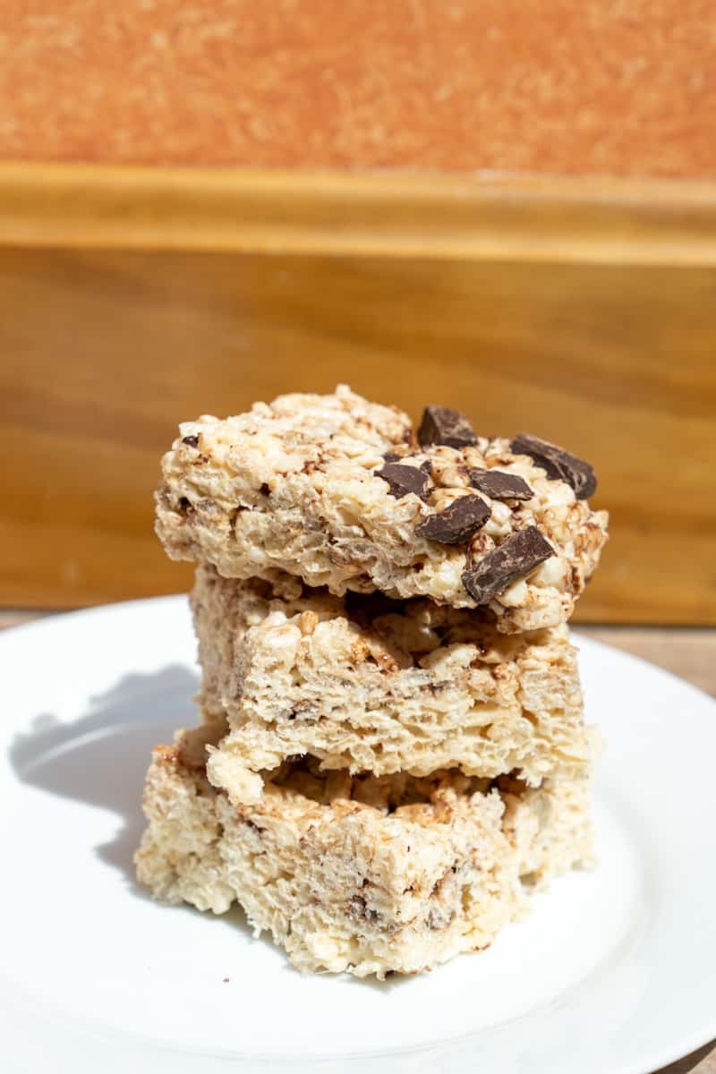 These Rice Krispie Chocolate Squares are made by melting butter and marshmallows and mixing in rice krispies and chocolate chips.