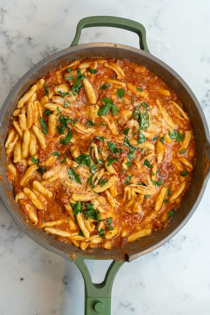 This Pink Sauce Pasta is made with onion, garlic, tomatoes, red pepper flakes, heavy cream and lots of parmesan cheese.