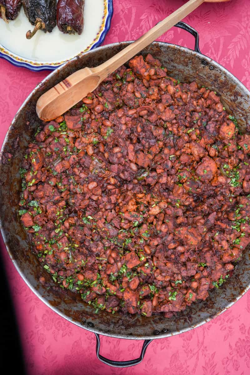 This Discada recipe is made with pork, chorizo, bacon, pinto beans and is so hearty, delicious and filling.