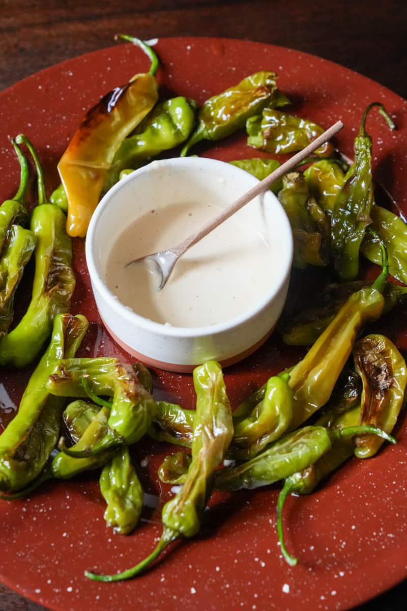 This Shishito Peppers Recipe is made with a delicious dipping sauce made of mayonnaise, soy sauce, rice vinegar, and wasabi.