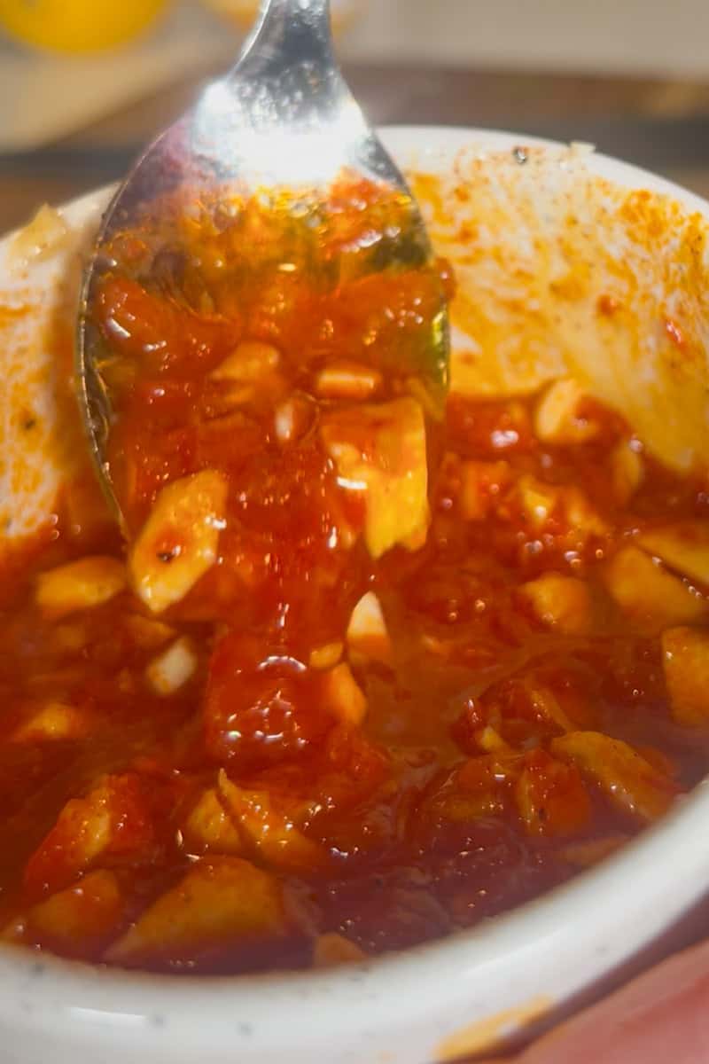 Harissa marinade with garlic, lemon, parsley and chili powder
