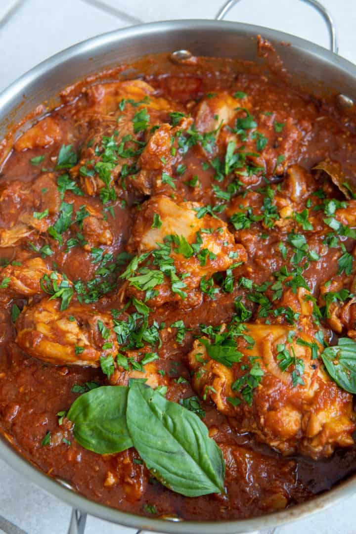 This Chicken Arrabiata is made with bone-in chicken, onions, artichokes, Arrabiata sauce, and simmered into perfection.