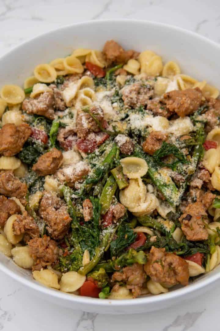 Cook the pasta in the same broccoli rabe water and put the pasta back into the pot according to package instructions. When both the sausage mixture and pasta are done, combine and enjoy! Top with parmesan cheese and red pepper flakes to your liking. Enjoy this Broccolini Sausage Pasta. 