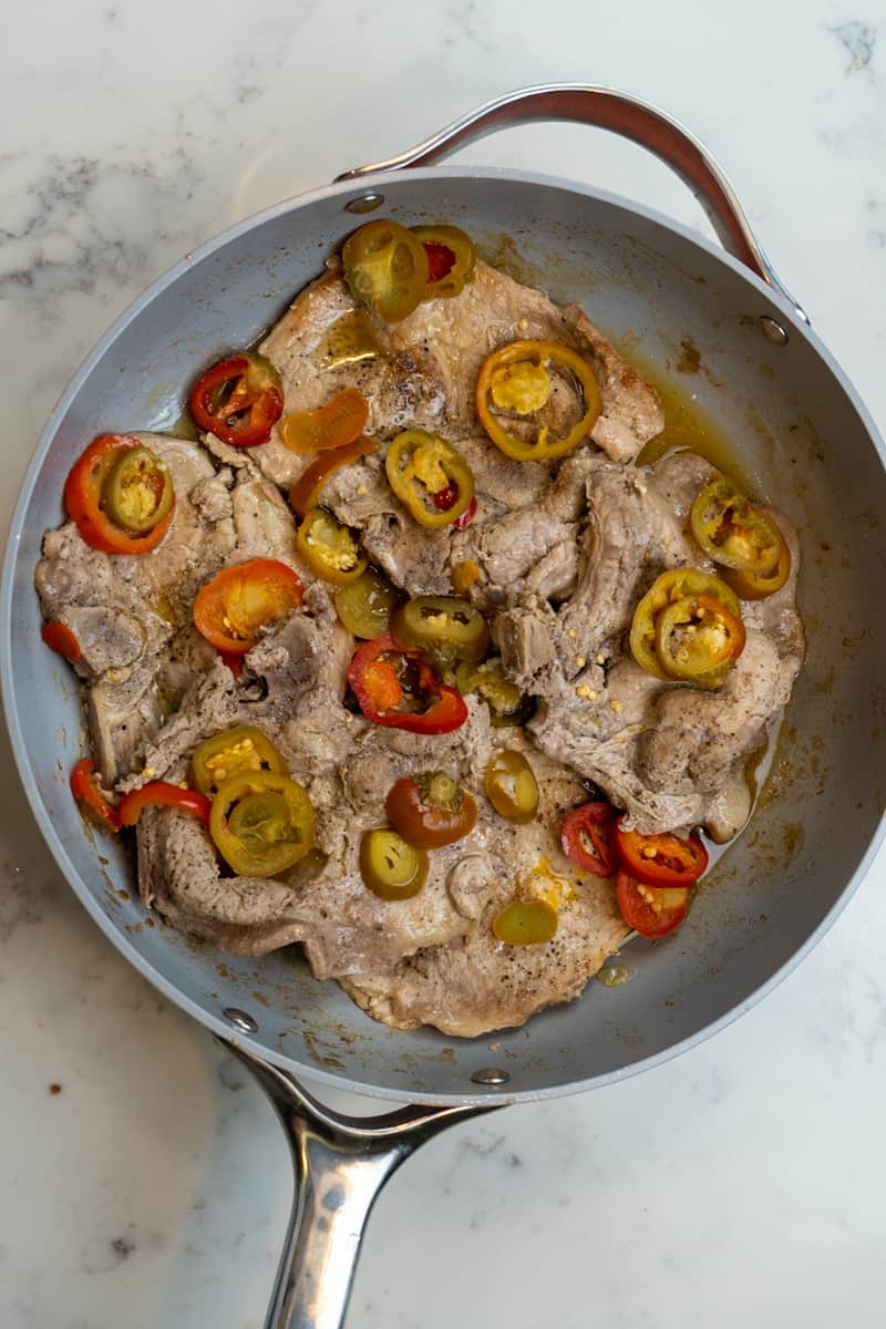 This Pork Chops Scarpariello is a super easy recipe for the avid spice lover, using a mix of hot and sweet cherry peppers.