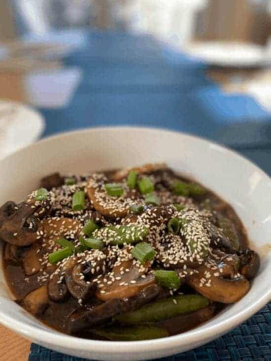 This Chinese Mushroom Stir Fry is made with chicken broth, honey, soy sauce, mushroom, snap peas, garlic, scallions and cooked to perfection.