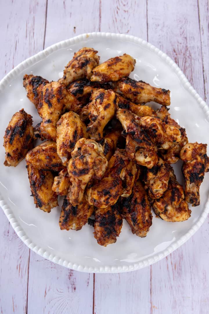 This Barbecue Chicken Wings Recipe is made with chicken wings, olive oil, lemons, Worcestershire sauce, marmalade, and horseradish.
