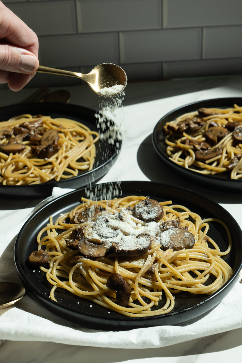 Remove from heat and add the reserved pasta water as well as the pasta. Top with parmesan cheese if you wish. Enjoy this Mushroom Pasta without Cream. 