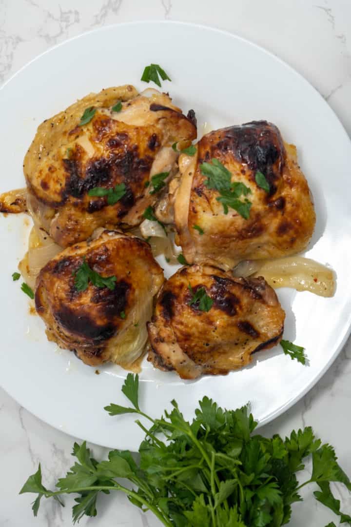 Take chicken out, reserving the juice, and add on a prepared baking sheet. Broil for 3-6 minutes, until the skin is crispy.