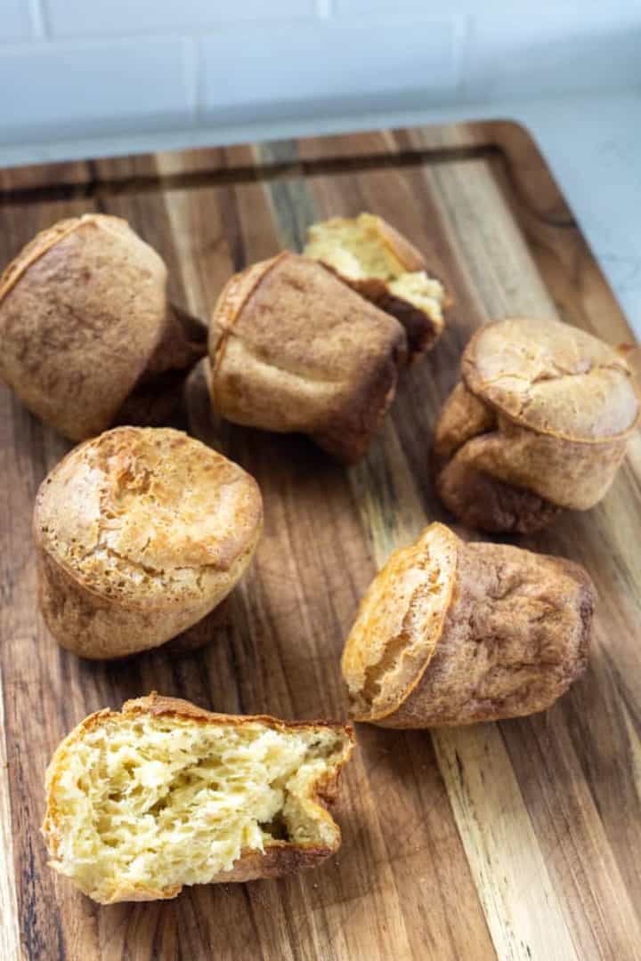 These Breakfast Popovers are made by blending milk, eggs, flour, and salt and baked into perfection.