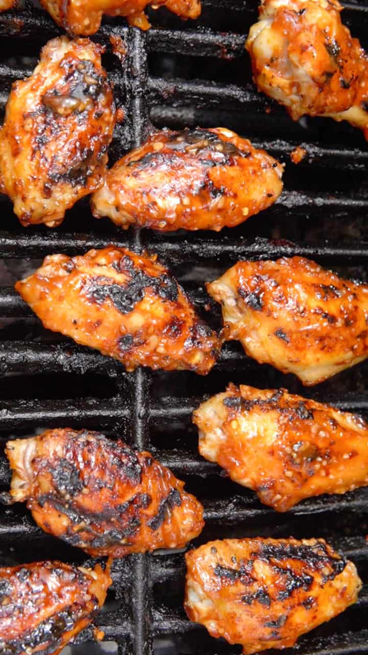 During the last two flips, with a basting brush, brush the citrus barbecue sauce all over the wings. Place on a plate and squeeze half a lemon on it. Serve and enjoy this Barbecue Chicken Wings Recipe. 