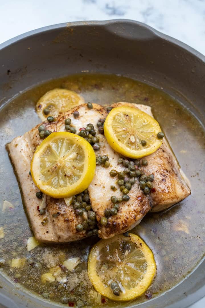 This Italian Mahi Mahi Recipe with Lemon Butter Sauce is made with mahi mahi, butter, garlic, white wine, lemon, capers, and parsley. 