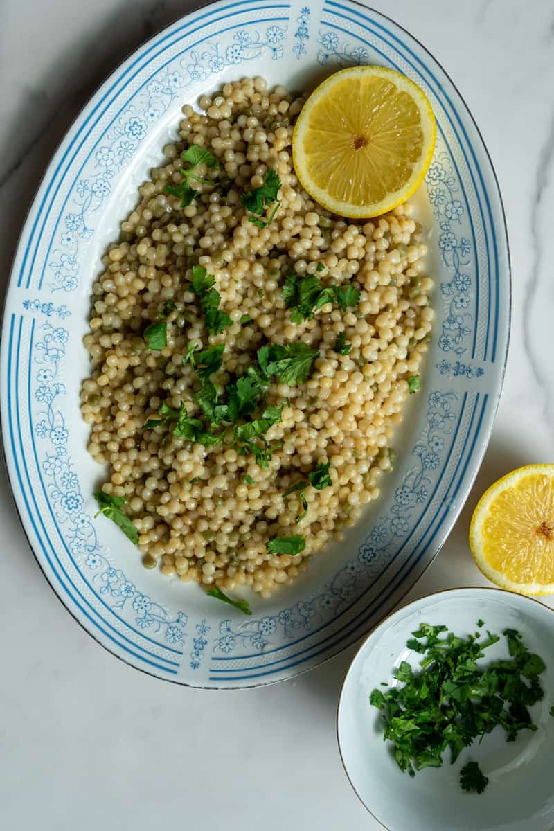 Add freshly squeezed lemon juice and garnish with fresh parsley. Enjoy this Instant Pot Pearl Couscous!