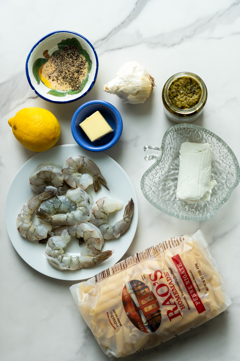 To make this Shrimp Goat Cheese pasta, you will need: Shrimp, Garlic powder, Butter, Garlic, Lemon, Pesto, Goat Cheese, Penne, Parmesan cheese, and Parsley.