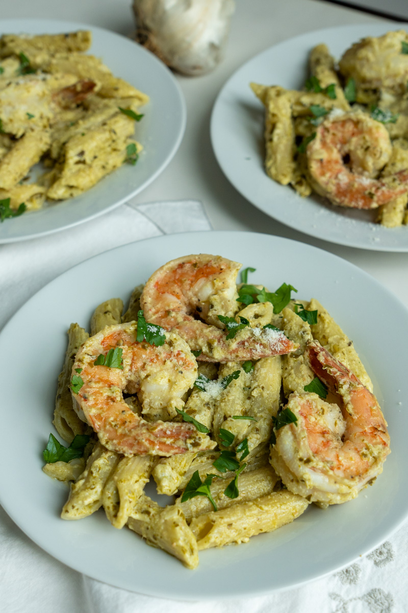 Garnish with parsley and top with parmesan cheese. Enjoy this Shrimp Goat Cheese Pasta. 