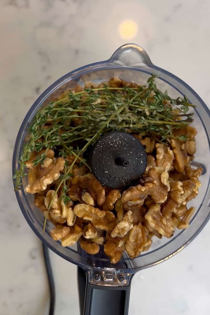 Dredge the chicken through the walnut mixture and press down to adhere. Place the coated chicken on the baking dish and repeat with the rest. Bake in the oven for 17-22 minutes, until the internal temperature reaches 165°F. 