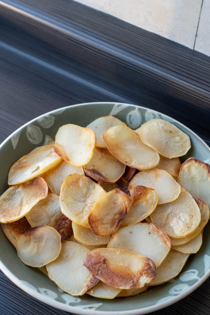 Serve with salt and enjoy these Baked Salt and Vinegar Chips. 