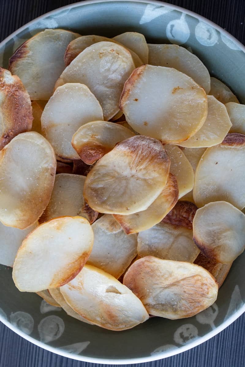 These Baked Salt and Vinegar Chips are made with russet potatoes, soaked in vinegar, and baked to perfection.