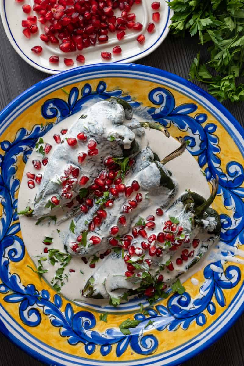 This Beef Stuffed Poblano Peppers dish is made with poblano peppers, ground beef, red onion, garlic, tomatoes and pomegranate seeds. 