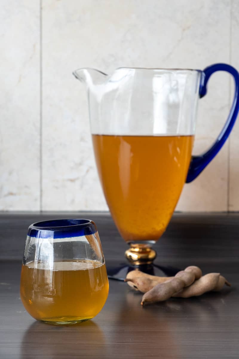 This Tamarind Tea is rich in antioxidants and made with three ingredients: tamarind pods, water and sugar.