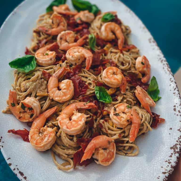 This Goat Cheese Pesto Pasta with Shrimp and Prosciutto is made with linguini, prosciutto, shrimp, goat cheese, pesto, lemons and cheese and a great Shrimp with Pasta Recipes!