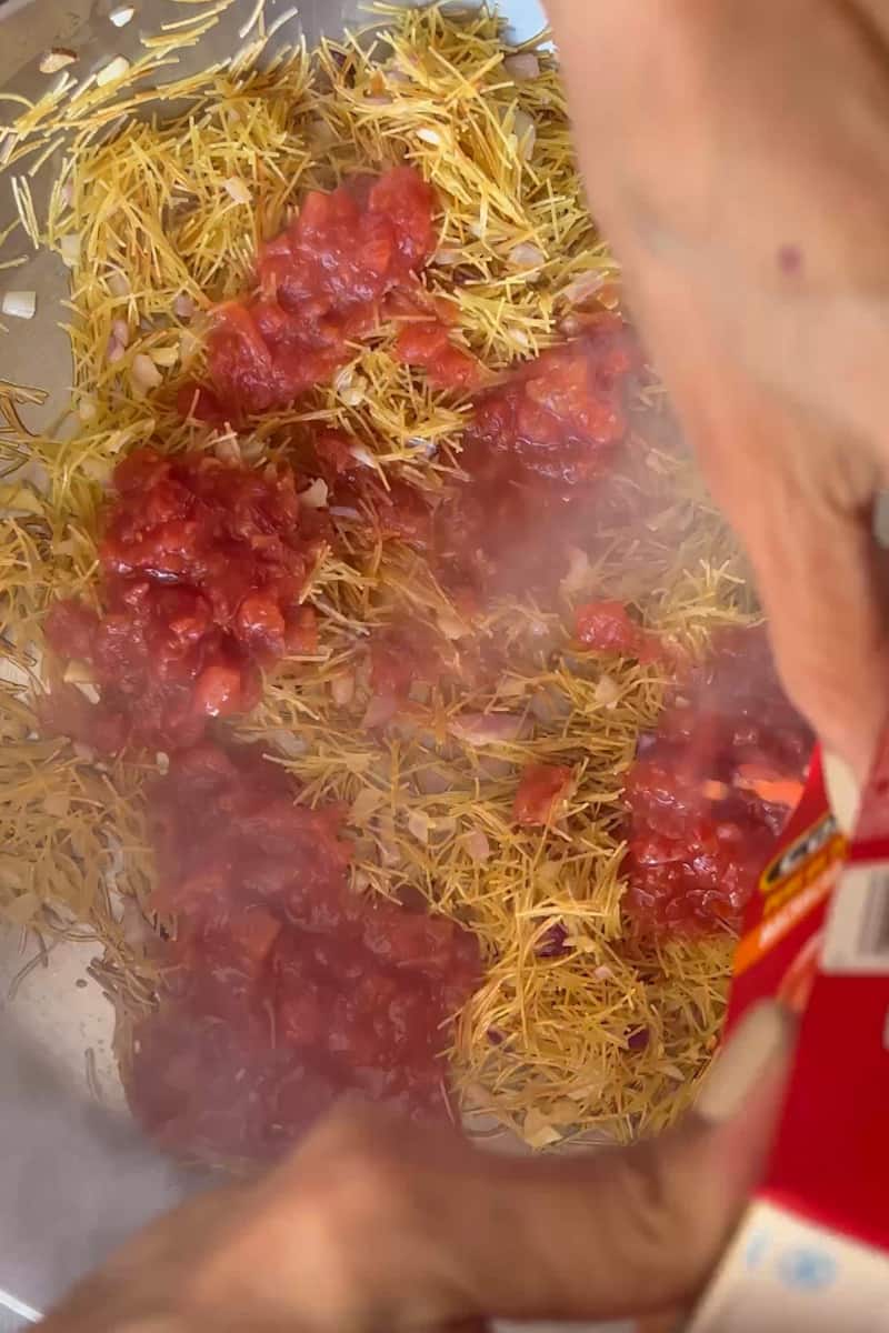 Stir often to avoid burning the noodles for about 2-3 minutes, until toasted. Add the can of diced tomatoes, stir for 1 minute.