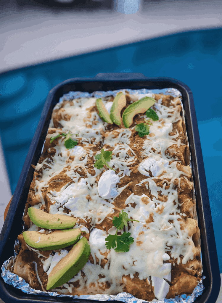 These Chicken Enchiladas with Salsa Verde are made with shredded chicken, tomatillos, serrano peppers, poblano peppers, and cilantro. 