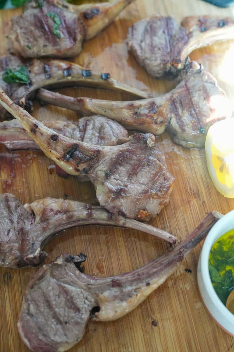 This Greek Lamb Chops Recipe is made with lamb chops seasoned with a Greek oregano marinade and served with mint sauce.