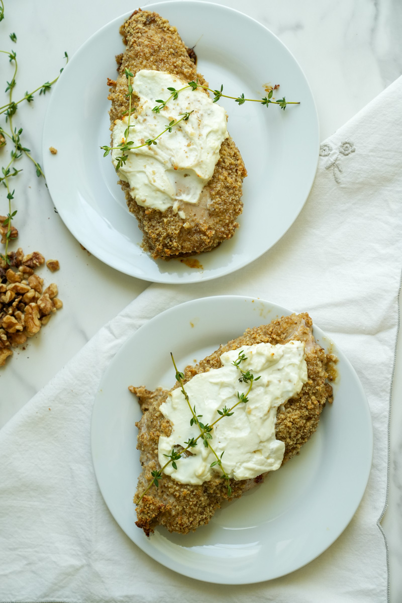 This Honey Walnut Chicken Recipe is made with chicken breasts, buttermilk, walnuts, flour, thyme, garlic powder, and honey. 