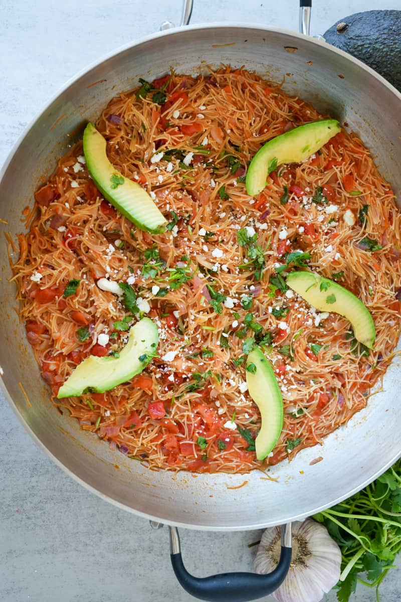 This Mexican Noodle Casserole (Sopa Seca) Recipe contains fideos, onion, garlic, and tomato. 