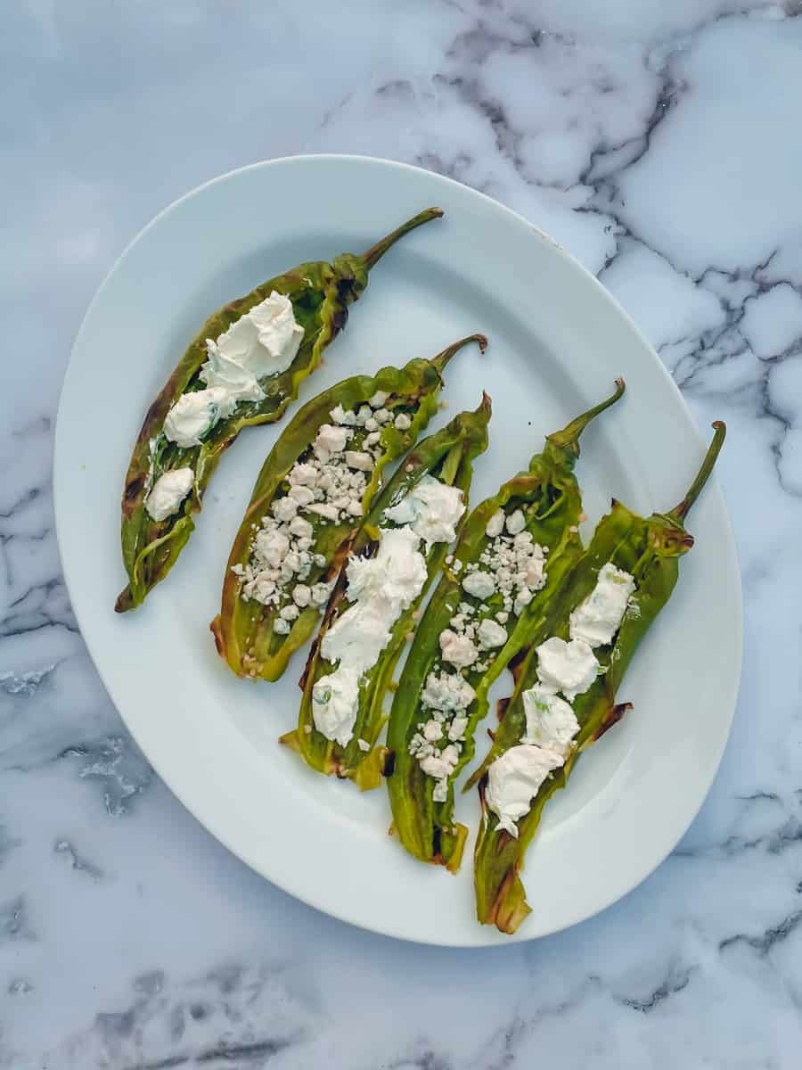 This Stuffed Anaheim Peppers Recipe is made with anaheim peppers, cream cheese, blue cheese, and salt.