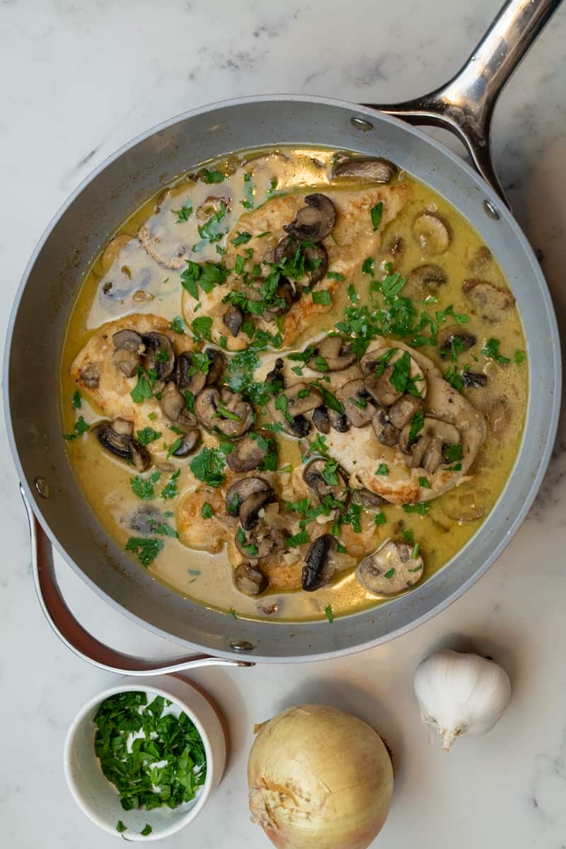 This Chicken Marsala Recipe is a classic Italian-American dish with chicken, almond flour, mushrooms, wine, and heavy cream.