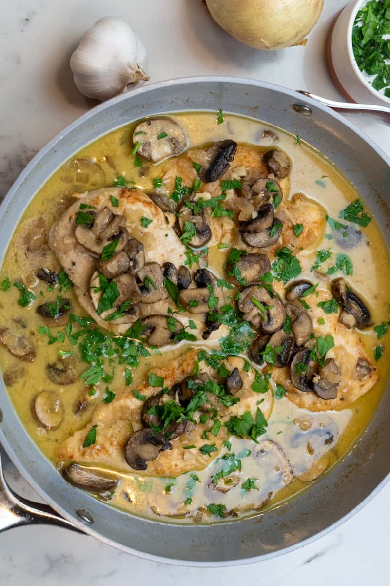 This Chicken Marsala Recipe is a classic Italian-American dish with chicken, almond flour, mushrooms, wine, and heavy cream.