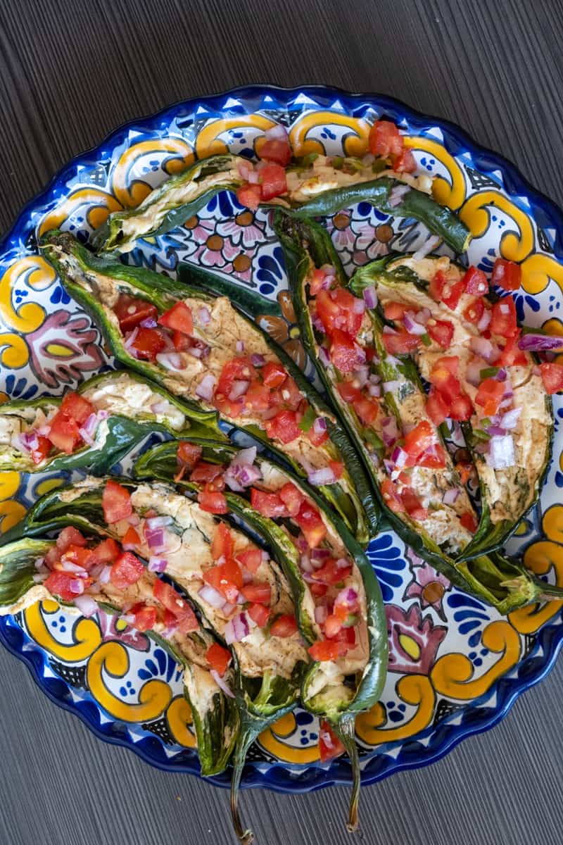 This Stuffed Anaheim Peppers Recipe is made with anaheim peppers, cream cheese, spices, pico de gallo and salt.