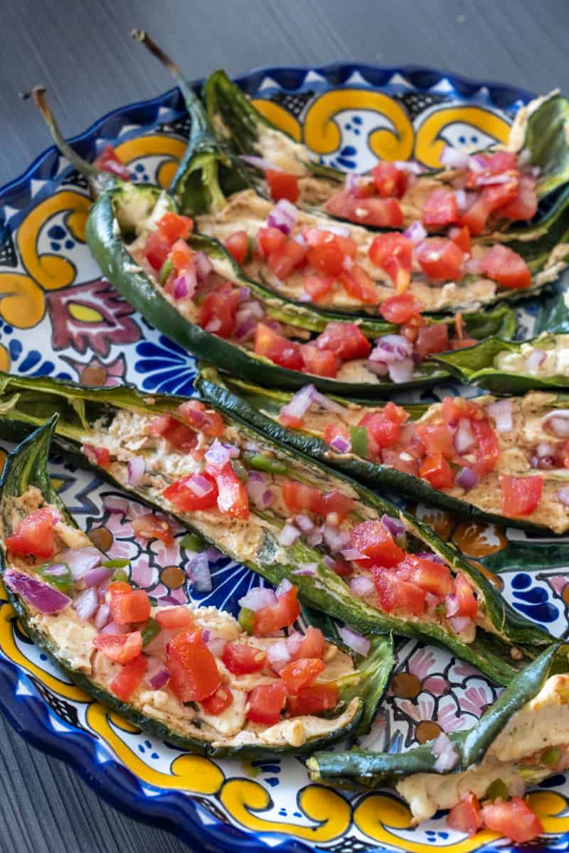 This Stuffed Anaheim Peppers Recipe is made with anaheim peppers, cream cheese, spices, pico de gallo and salt.