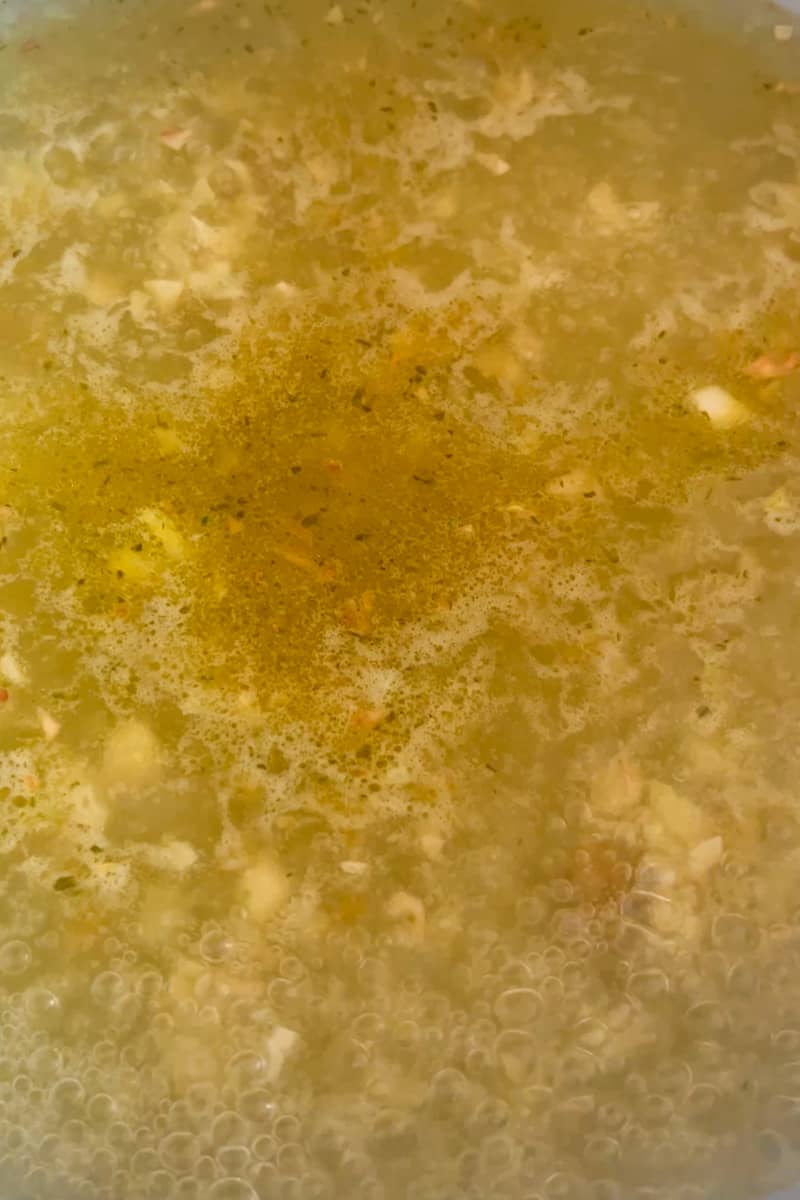 Add 3 cups of water and 3 bouillon cubes. Simmer water with garlic for 10 minutes.