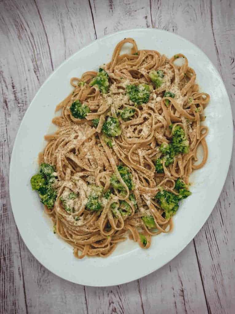 This Fettuccine with Broccoli is made with garlic, chicken bouillon, broccoli, eggs, fettuccini, and parmesan. 