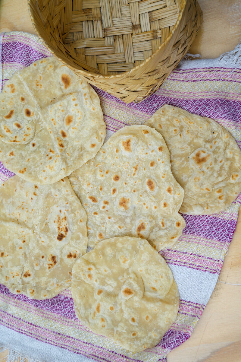 Flip and do the same on the other side. Keep flipping until the middle is throughly cooked. Repeat with the rest. Enjoy this Authentic Flour Tortilla Recipe.