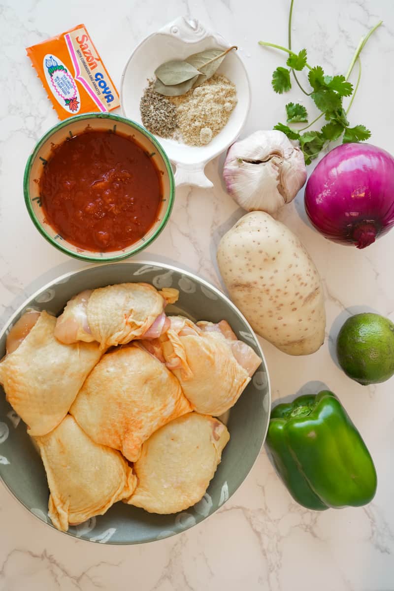 This Pollo Guisado Recipe (Dominican Chicken Stew) is made with onion, potatoes, bell peppers, sazón and braised to perfection. 